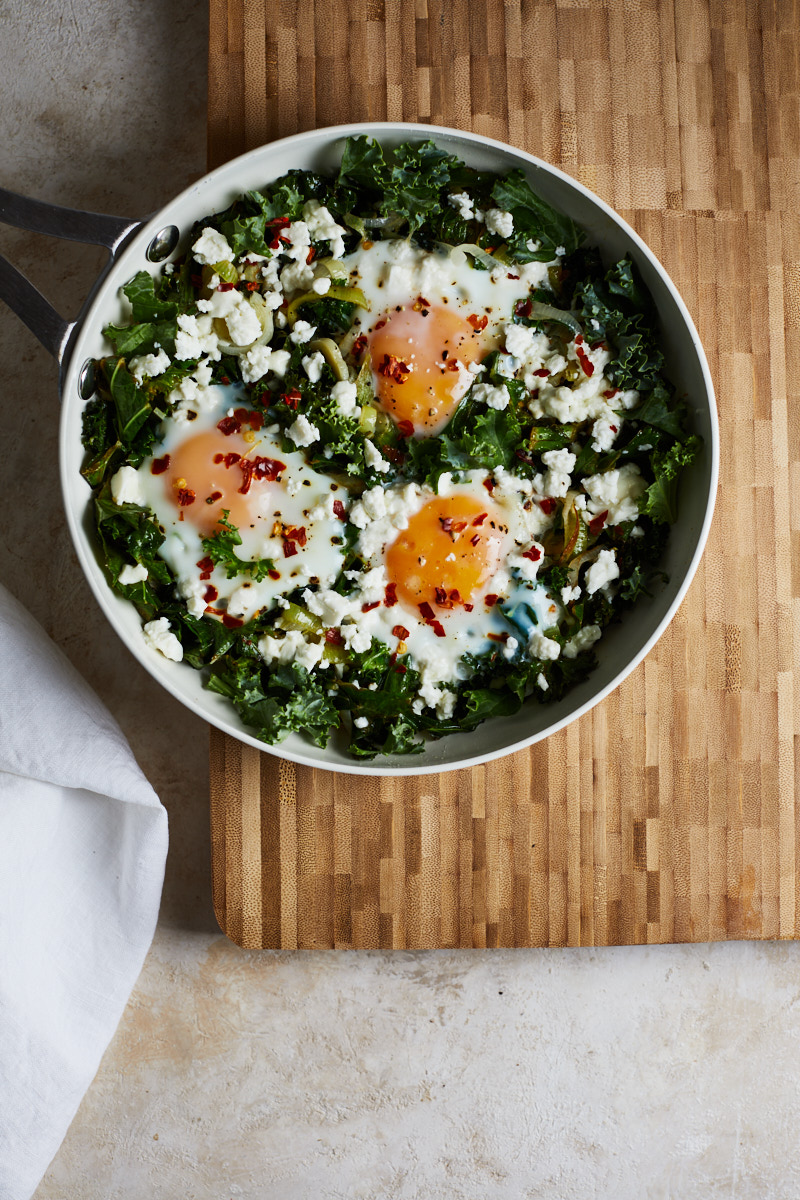 Scrambled eggs with feta, kale, and leek